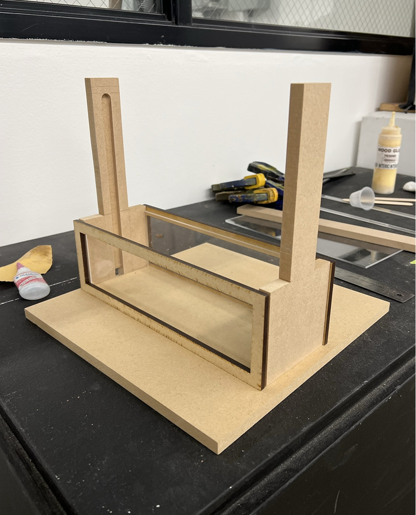 Bare MDF frame parts on the workbench